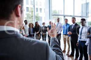 Businessman interacting with colleagues