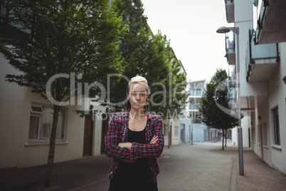 Woman standing with arms crossed