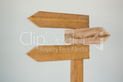 Wooden arrow direction sign post