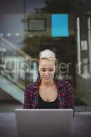 Woman using laptop