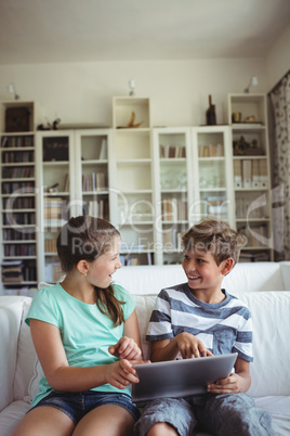 Children using digital tablet