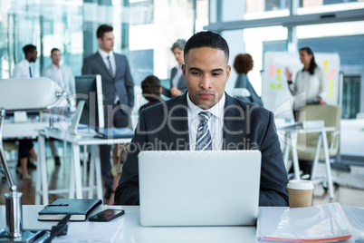 Businessman working on laptop