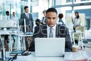 Businessman working on laptop