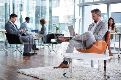 Businessman working on laptop