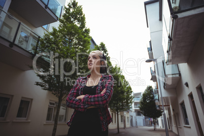 Portrait of woman standing in street