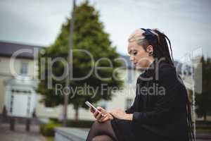 Businesswoman using mobile phone