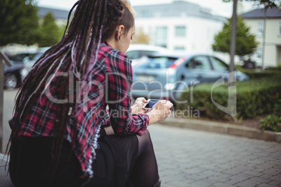 Woman using mobile phone