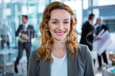 Smiling businesswoman in office