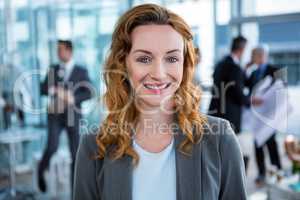 Smiling businesswoman in office