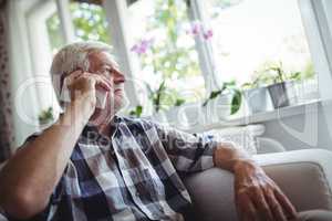 Senior man talking on mobile phone