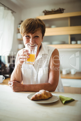 Senior woman having breakfast