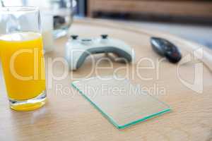 Juice with a piece of glass on a table