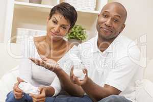 African American Couple Playing Video Console Game