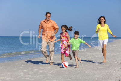 Family Playing Football Soccer on Beach