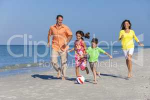 Family Playing Football Soccer on Beach
