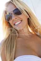 Beautiful Blond Woman in White Dress and Sunglasses