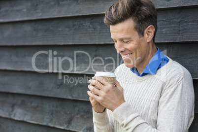 Happy Middle Aged Man Drinking Coffee