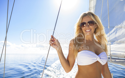 Beautiful Young Blond Woman on a Sail Boat