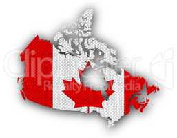 Karte und Fahne von Kanada auf altem Leinen