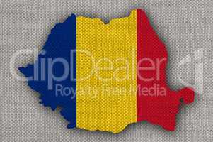 Karte und Fahne von Rumänien auf altem Leinen