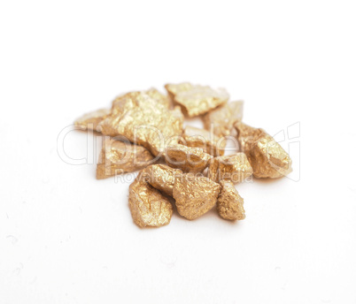 Golden nuggets on white