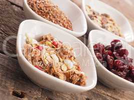 Muesli ingredients on rustic wood