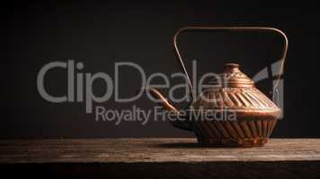 Old used copper tea pot