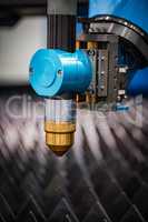 CNC Laser plasma cutting of metal, modern industrial technology.