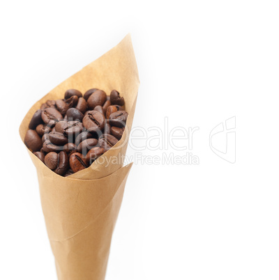 espresso coffee beans on a paper cone