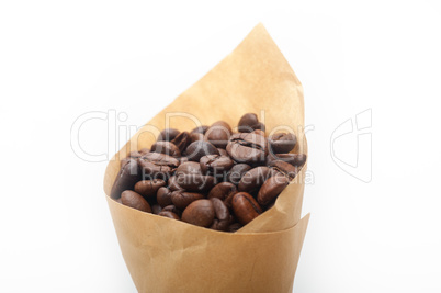 espresso coffee beans on a paper cone