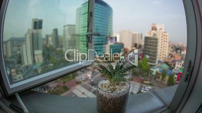 Timelapse of busy Seoul city in South Korea, window view