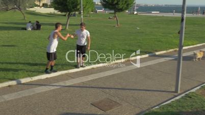 In city of Thessaloniki, Greece two young boys doing parkour