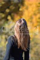 Long haired girl in autumn