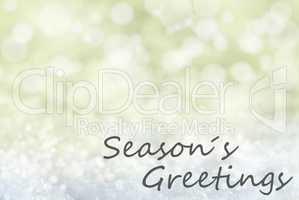 Golden Bokeh Christmas Background, Snow, Text Seasons Greetings