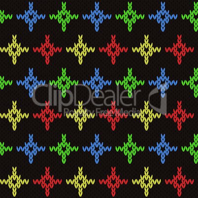 Seamless knitting pattern with color crosses over dark brown
