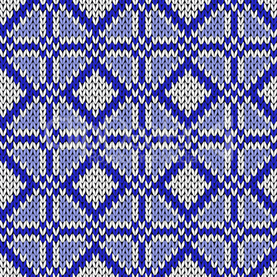 Seamless geometrical knitting pattern in blue and white
