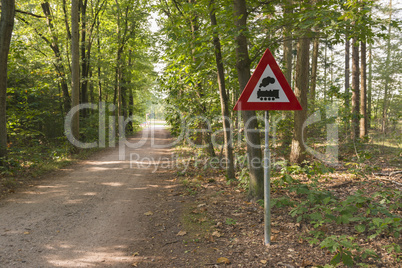 Warning sign with meaning level crossing without barriers in the