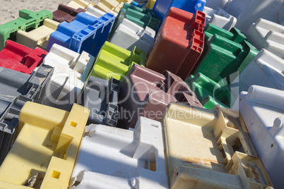 Colourful collection of old plastic crates.