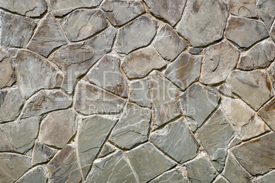 Fragment of an ancient wall from stones. (Background image)