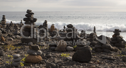 Piles from rocks on the rocky beach