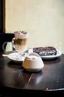 Cup of espresso, chocolate cake