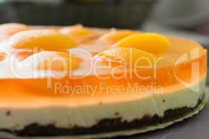 Cheesecake with apricot slices