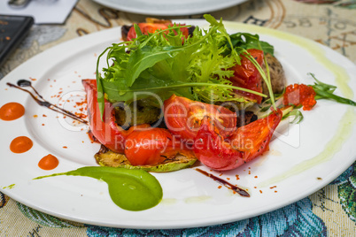 Baked tomatoes and peppers with Greens