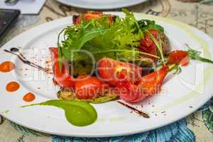 Baked tomatoes and peppers with Greens