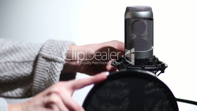 Microphone and pop filter in sound studio