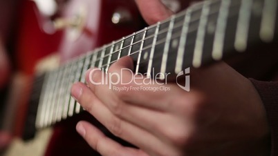 Guitar player using tapping technique