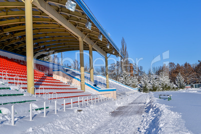 Background chairs at stadium , winter