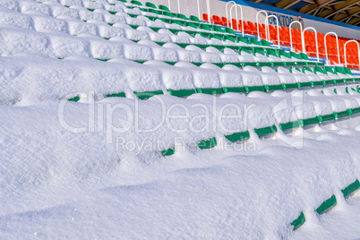 Background chairs at stadium , winter