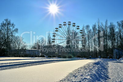 City park, covered with snow on a clear winter day