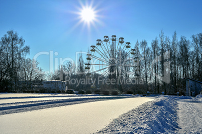 City park, covered with snow on a clear winter day